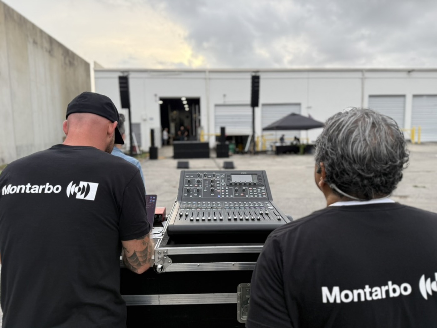 Montarbo team listening from the console during a speaker demo